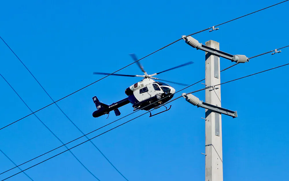 Aerial thermography with infrared camera - Inspection of long-distance power lines 